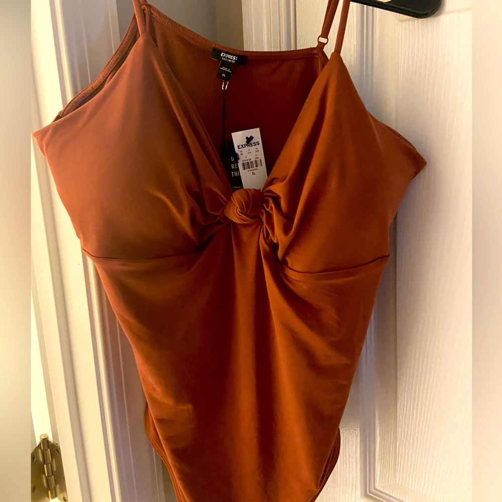 NWT Express rust colored padded bodysuit .  Size XL